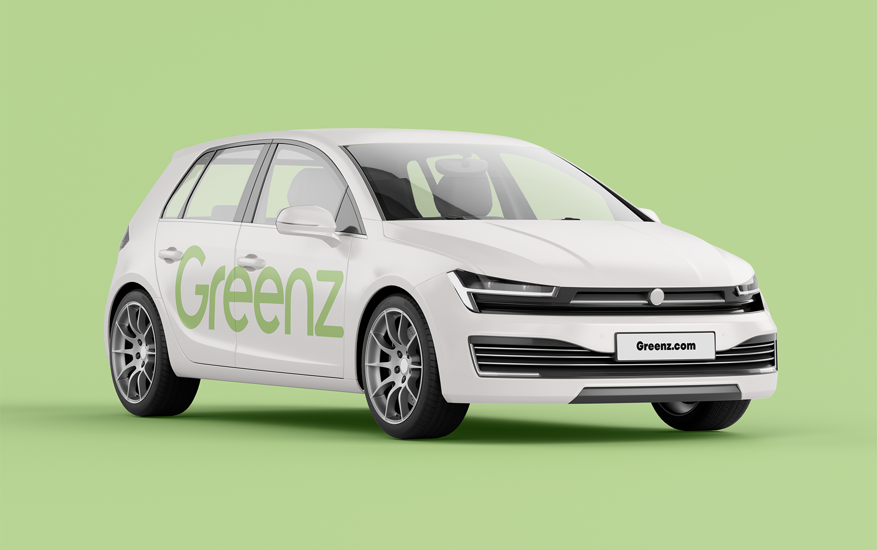 White hatchback with Greenz ride-sharing branding on a green background